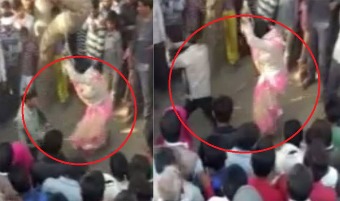 पेड़ से बांधकर महिला को बेल्ट और डंडों से पीटा, VIDEO वायरल